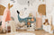 Papier peint mural de baleines mignonnes dans une nurserie avec papier peint et canopy