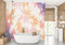 Baignoire autoportante blanche avec robinet noir mat et porte-bain en bois, décoration murale sunset tropique