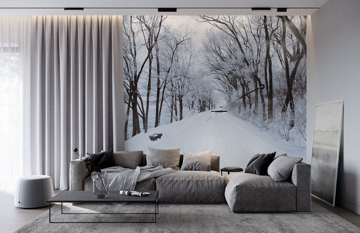 Canapé sectionnel gris avec coussins et couverture, idéal pour décoration personnalisée chemin forestier enneigé