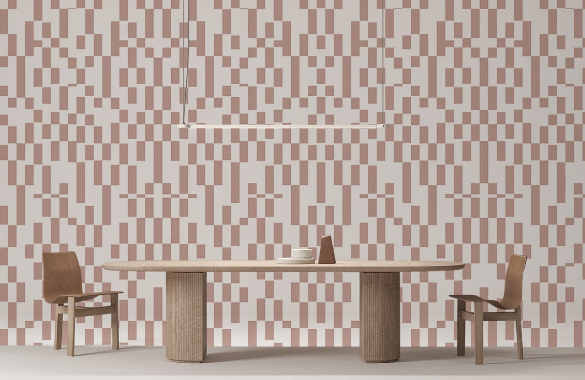 Image d’une table à manger en bois avec deux chaises, dans un décor avec papier peint moderne géométrique Bauhaus rose et blanc