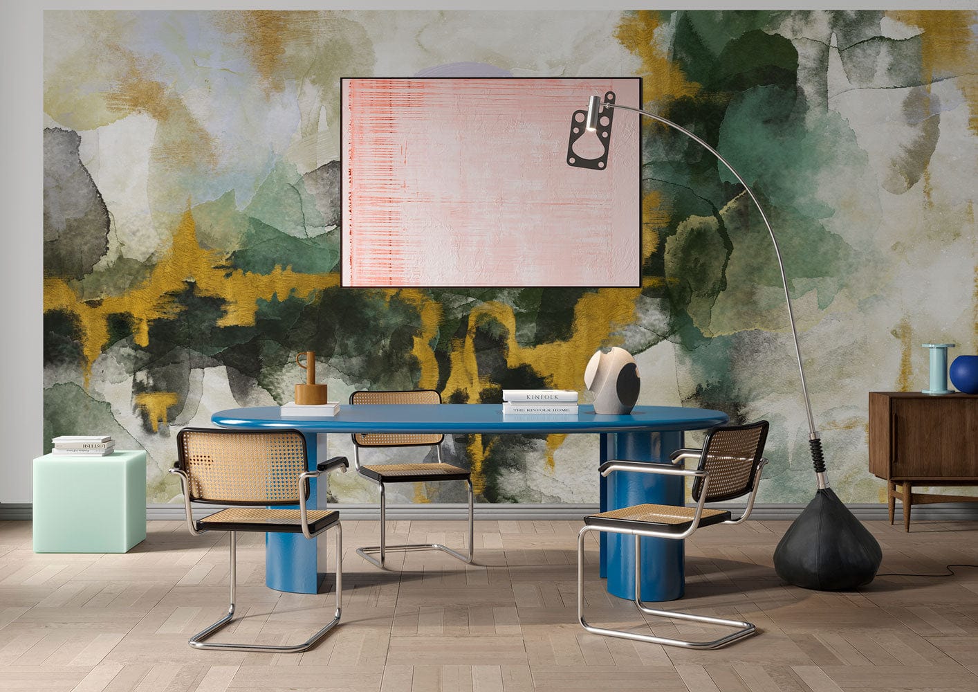 Table ovale bleue avec deux piédestaux cylindriques, idéal pour peinture murale aquarelle