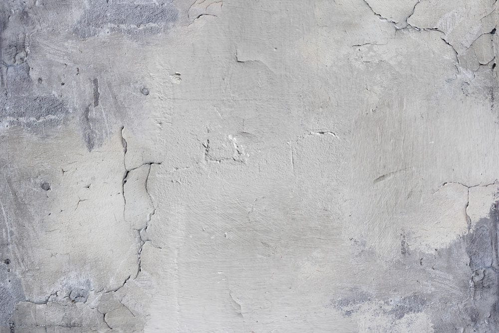 Papier peint mural blanc moucheté avec mur en béton fissuré et briques apparentes