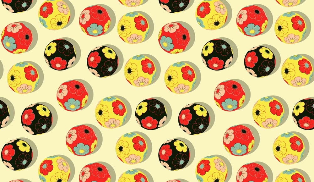 Papier peint mural avec motif de balles brodées colorées en rouge, noir et jaune