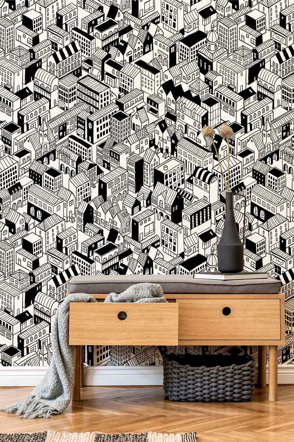 Banquette de rangement en bois avec coussin gris et drap, idéal pour papier peint mural