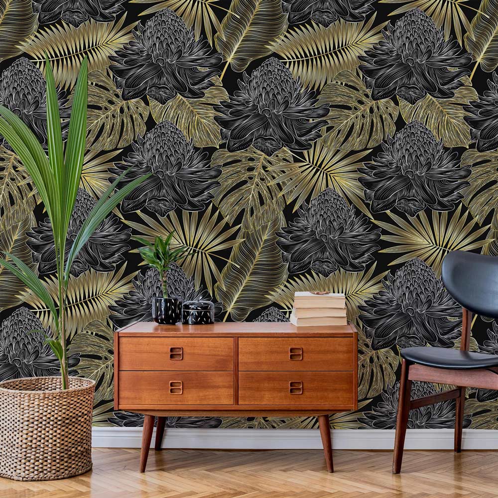 Papier peint mural doré et sombre avec motif tropical de feuilles et fleurs