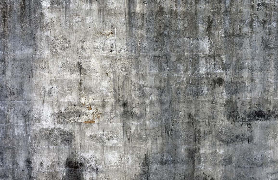 Papier peint mural effet béton avec mur en béton gris usé et taché pour décoration intérieure