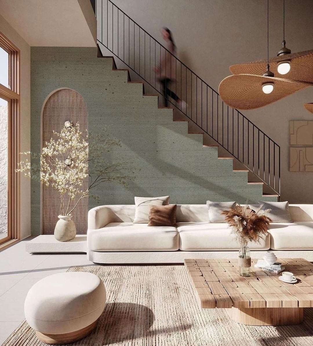 Papier peint mural en béton perforé dans un salon moderne avec canapé blanc et escalier