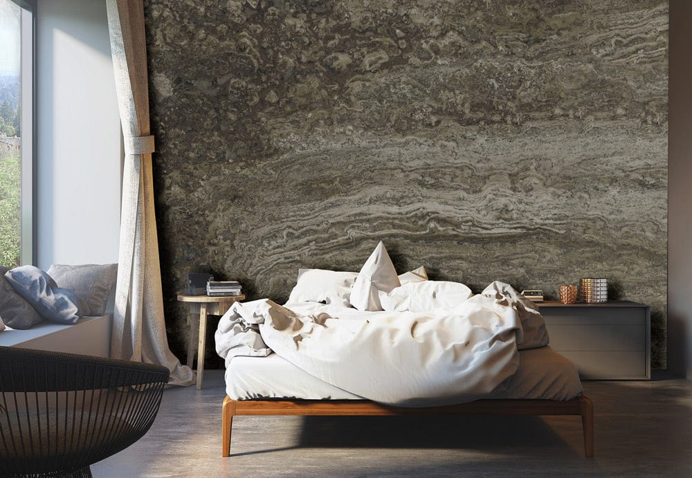 Papier peint mural en pierre grise dans une chambre avec mur d’accent texturé