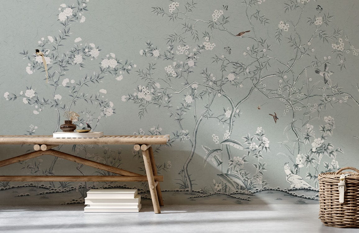 Papier peint mural fleur Chinoiserie avec arbres en fleurs et oiseaux sur fond vert pâle