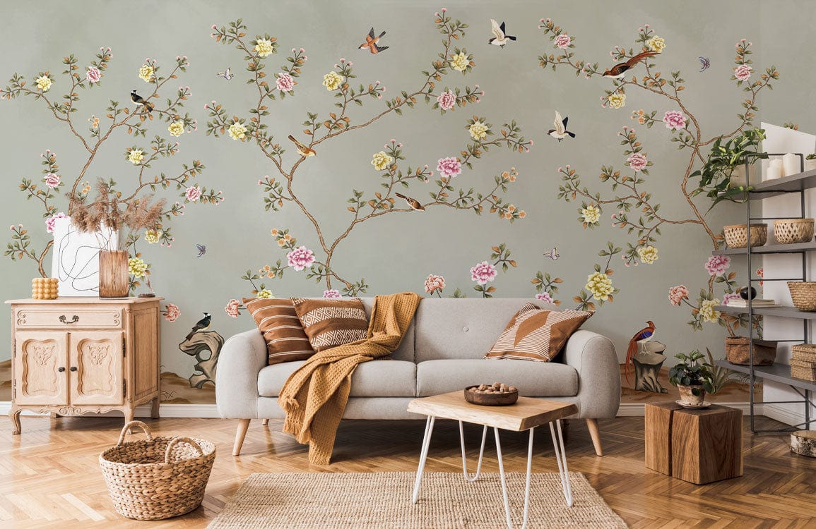 Canapé gris clair avec coussins et pieds en bois, idéal pour peint mural jardin