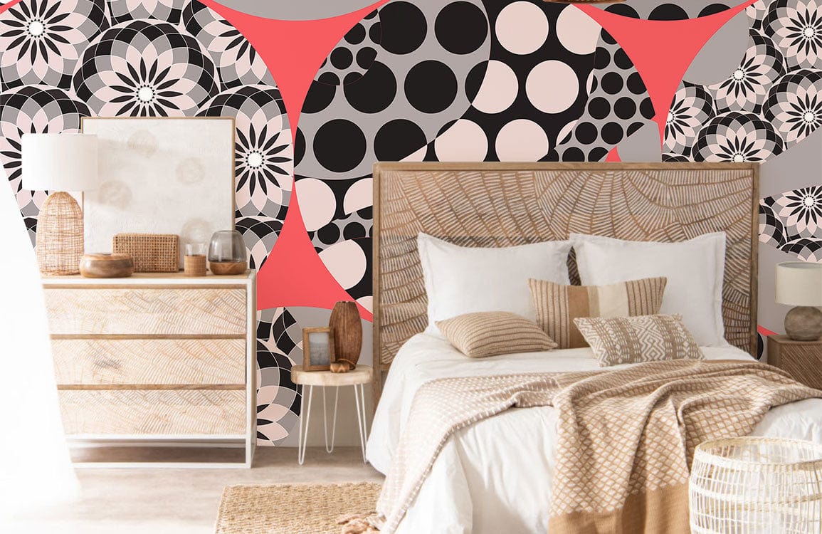 Papier peint mural kaléidoscope noir et rose dans une chambre cozy avec tête de lit en rotin