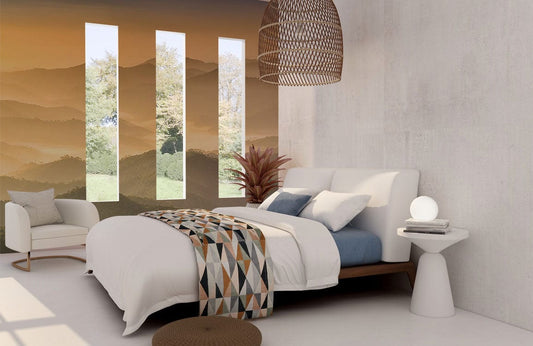 Photo d’une chambre cosy avec un papier peint mural montagnes et literie blanche et bleue