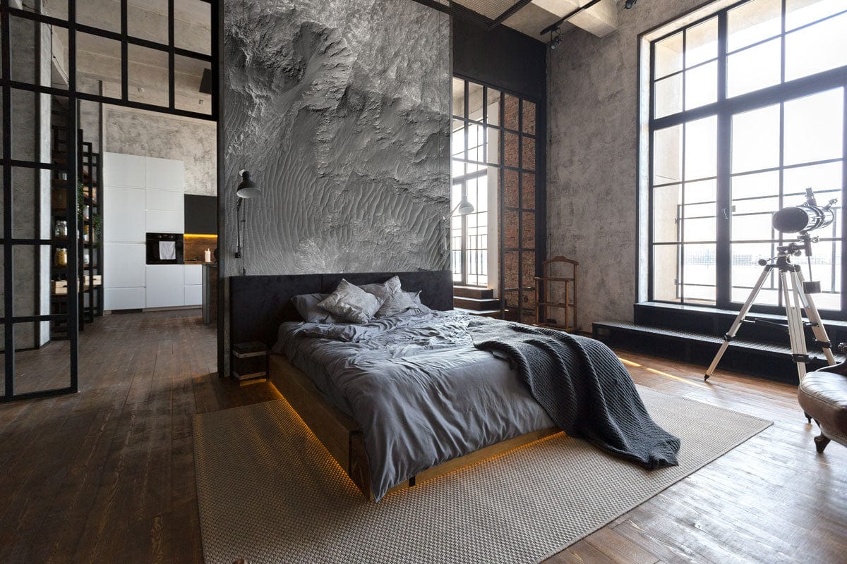 Photo d’une chambre moderne avec papier peint mural motif roche lunaire et éclairage subtil