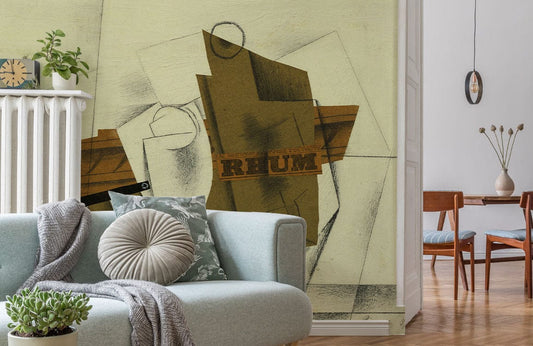 Papier peint mural représentant une pipe, un verre et une bouteille de rhum dans un salon avec canapé bleu pâle, couverture et coussins