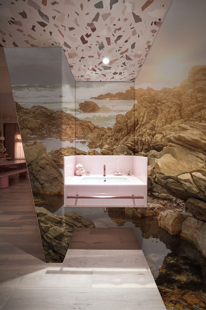 Lavabo mural moderne rose avec robinet, idéal avec le papier peint mural Rocher près de l’océan