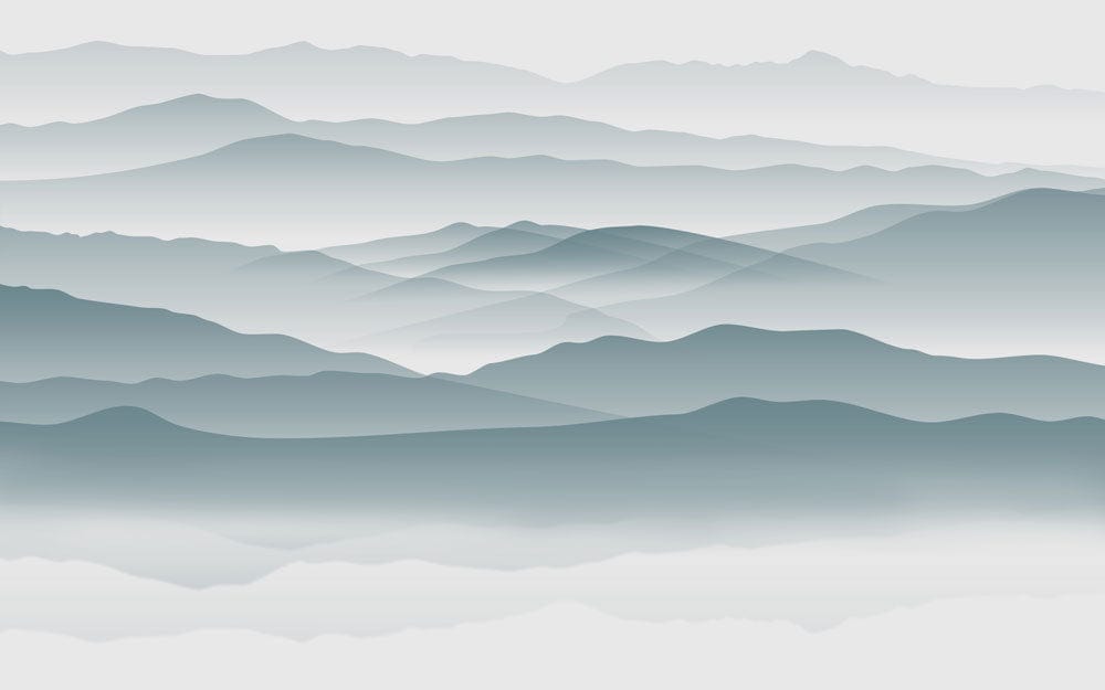 Papier peint mural Traversée des montagnes avec montagnes brumeuses et paysage serein