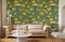 Sofa beige deux places avec bras arrondis sur le papier peint mural Vie de Girafe