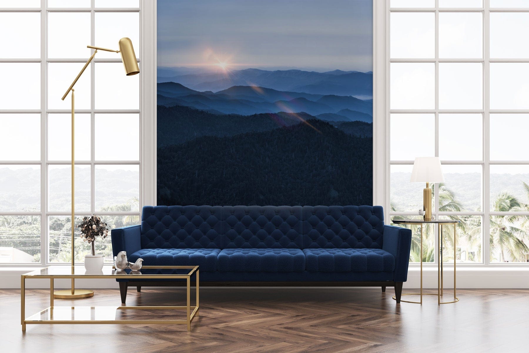 Sofa en velours bleu tufté avec papier peint panoramique des montagnes pour décoration intérieure