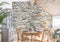 Papier peint texture mur de pierre dans une salle à manger avec accent mural en pierre
