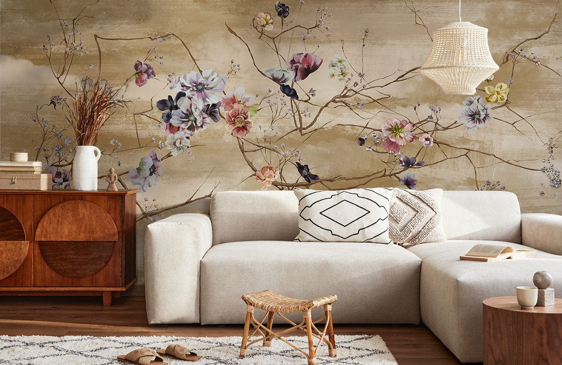 Canapé sectionnel clair avec coussins décoratifs, idéal pour peinture murale branches fleuries